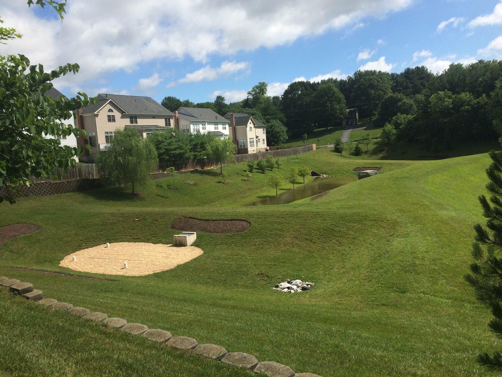 Sand-filter stormwater practice beside a dry detention pond.